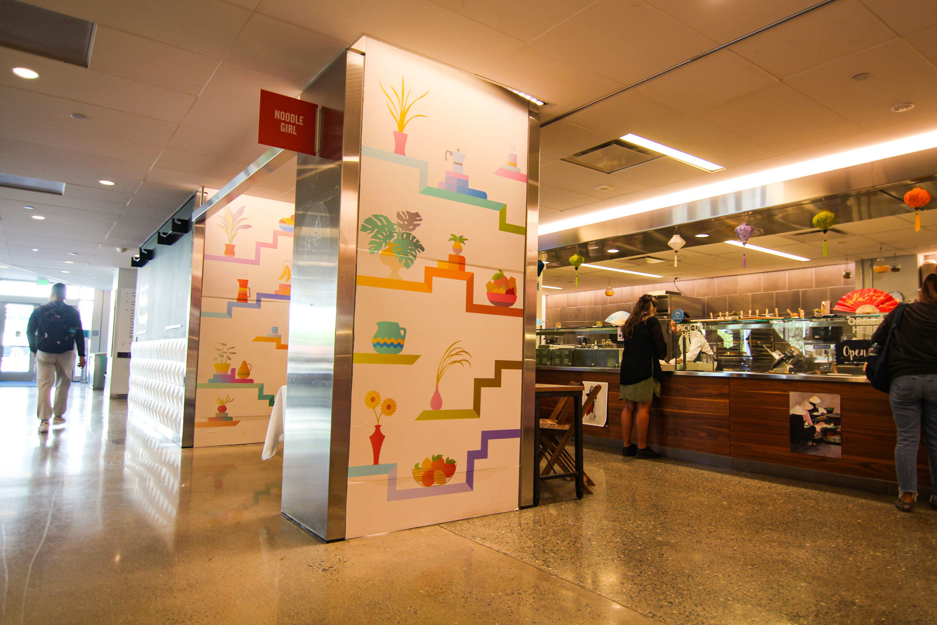 "Kitchen Tableau" is a series of four murals installed with adhesive vinyl in the dining room of the ASUC Student Union.